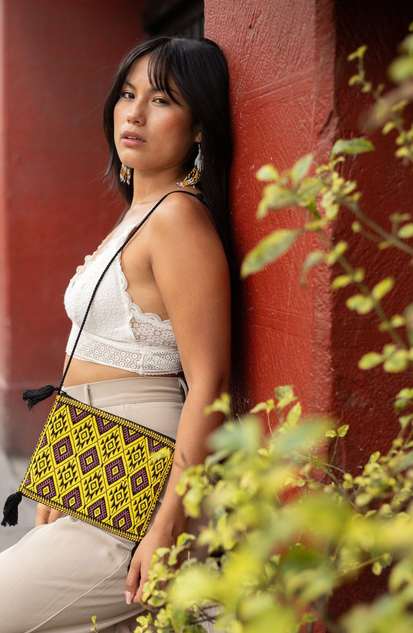 woman wearing da nang Textile Bag Textile Bags handmade Mother Sierra chiapas mexico mexican accessories native american statement piece yellow black